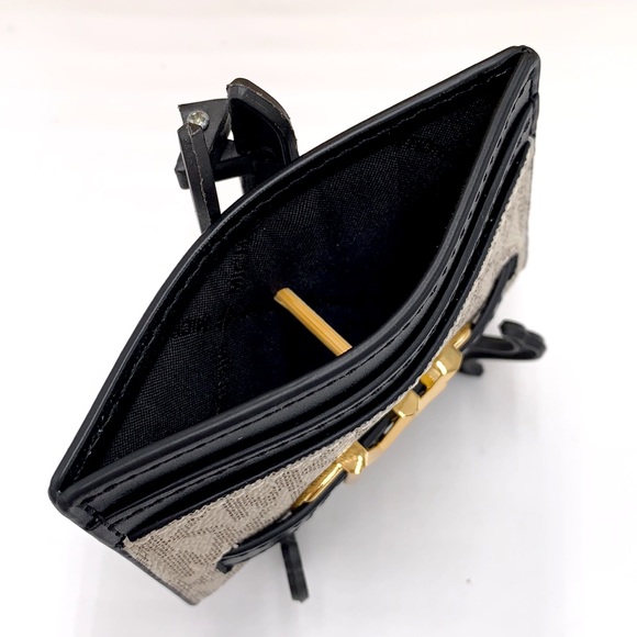 MICHAEL KORS
Reed Large Card Holder
Case Wallet
COLOR: VANILLA BLACK SIGNATURE - Picture 6 of 9